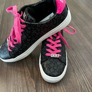 DKNY sneakers.  Never worn, New with tags.  True to size.
